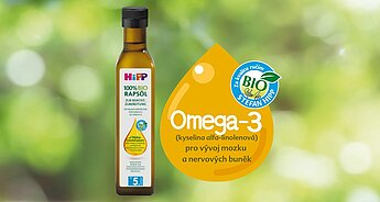 Hnědá láhev s nápisem "100% BIO RAPSOL" s grafikou kapky a textem "Omega-3 (kyselina alfa-linolenová) pro vyvoj mozku a nervových buněk" je zobrazena na rozmazaném zeleném pozadí.