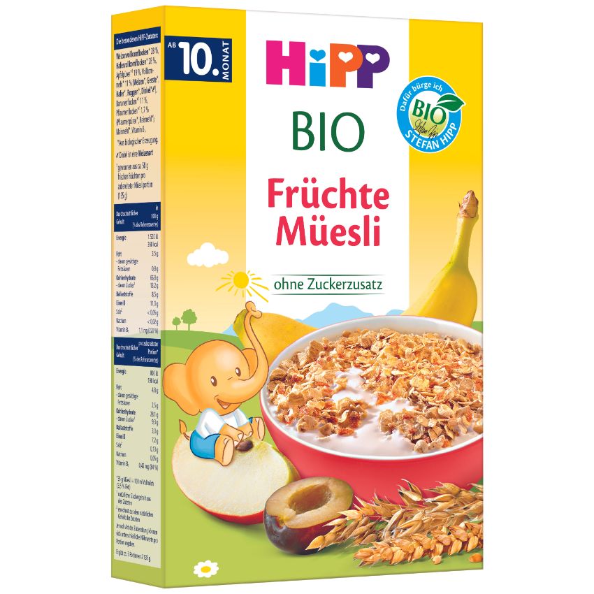 Krabice organického müsli s kresleným slonem, miskou müsli a banánem na přední straně, s nutričními informacemi na boku.