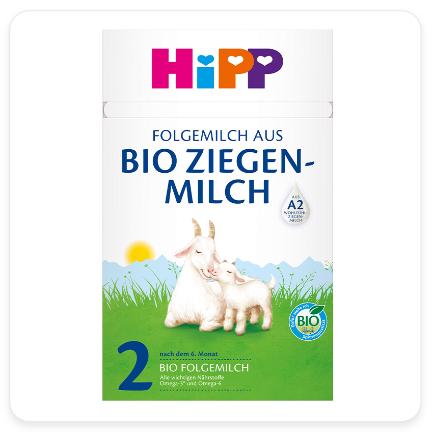 Etiketa výrobku pre detskú výživu s ilustráciou kozy a kozliatka, slovom "BIO" označujúcim organický obsah a číslom "2", ktoré naznačuje, že ide o druhú fázu detskej výživy.